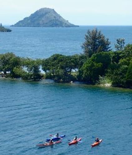 Kayaking on Lake Kivu near a small island