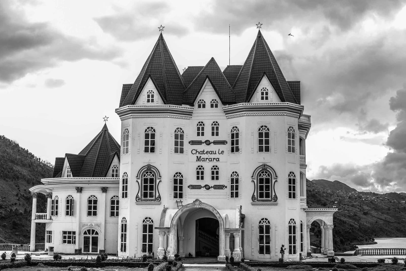Black and white photograph of a historic mansion in Rwanda