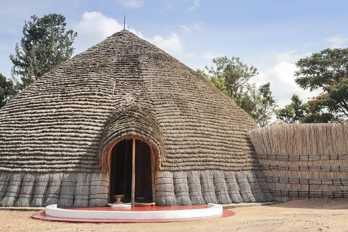 Large reed-thatched traditional royal hut in Nyanza